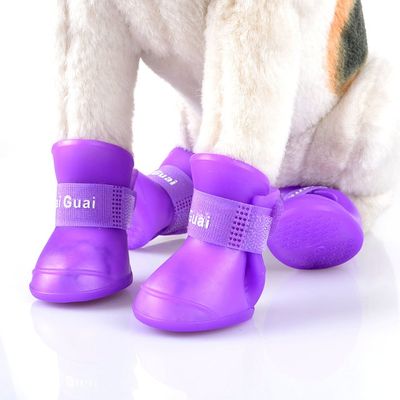 Dog rain shoes with brand logo