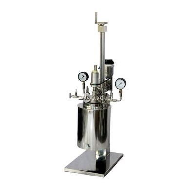 Lift and tilt laboratory stirred pressure autoclave