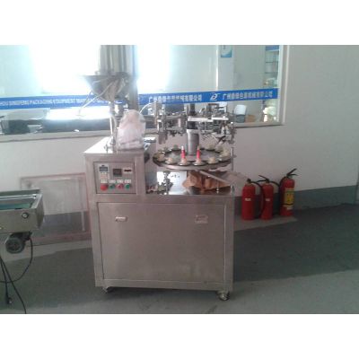 Automatic tube filling and sealing machine with printing function