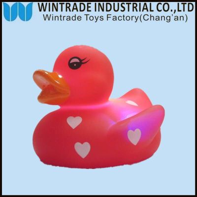 rubber bath duck toy floating
