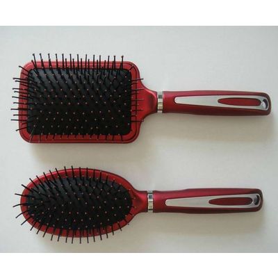 Plastic paddle hair brush