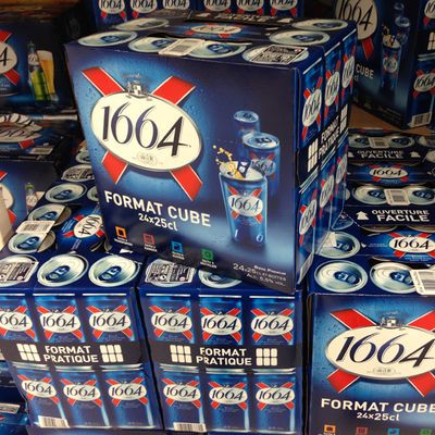 Kronenbourg 1664 blanc beer in blue 25cl and 33cl bottles and 500cl Cans
