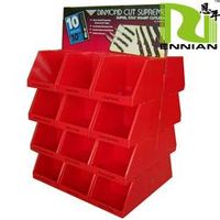 red trapeziform cardboard display stand thumbnail image